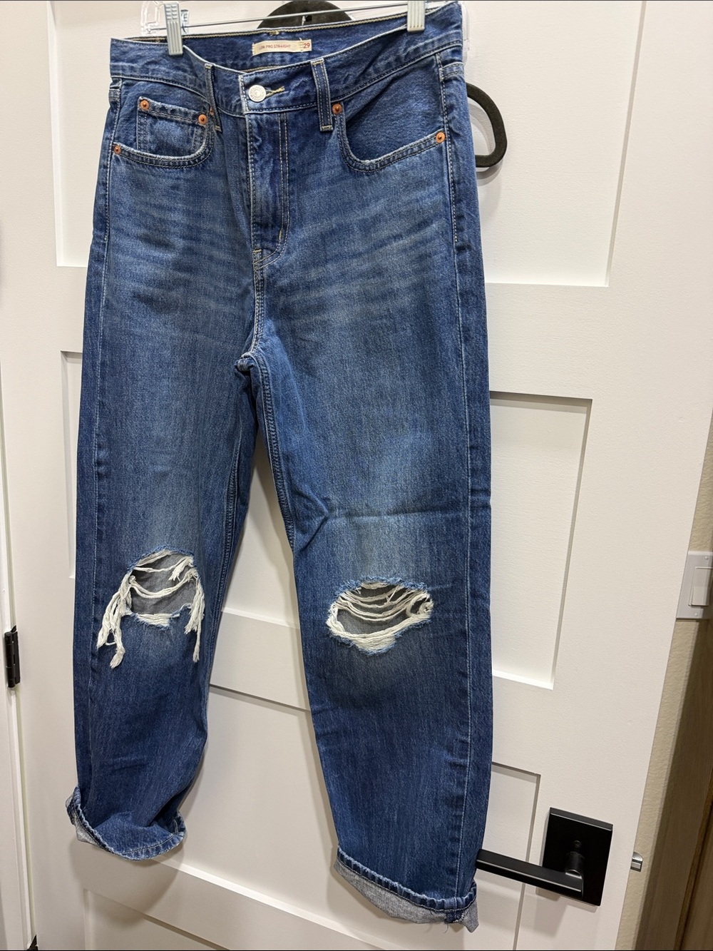 Levi's Boyfriend Jeans in Medium Blue with Knee Distressing